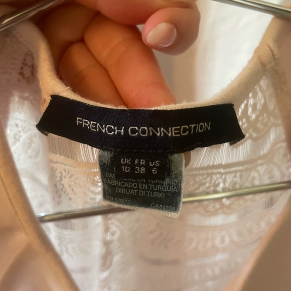 Small blush colored with detailed back, above the knee form fitting dress - Picture 2 of 3